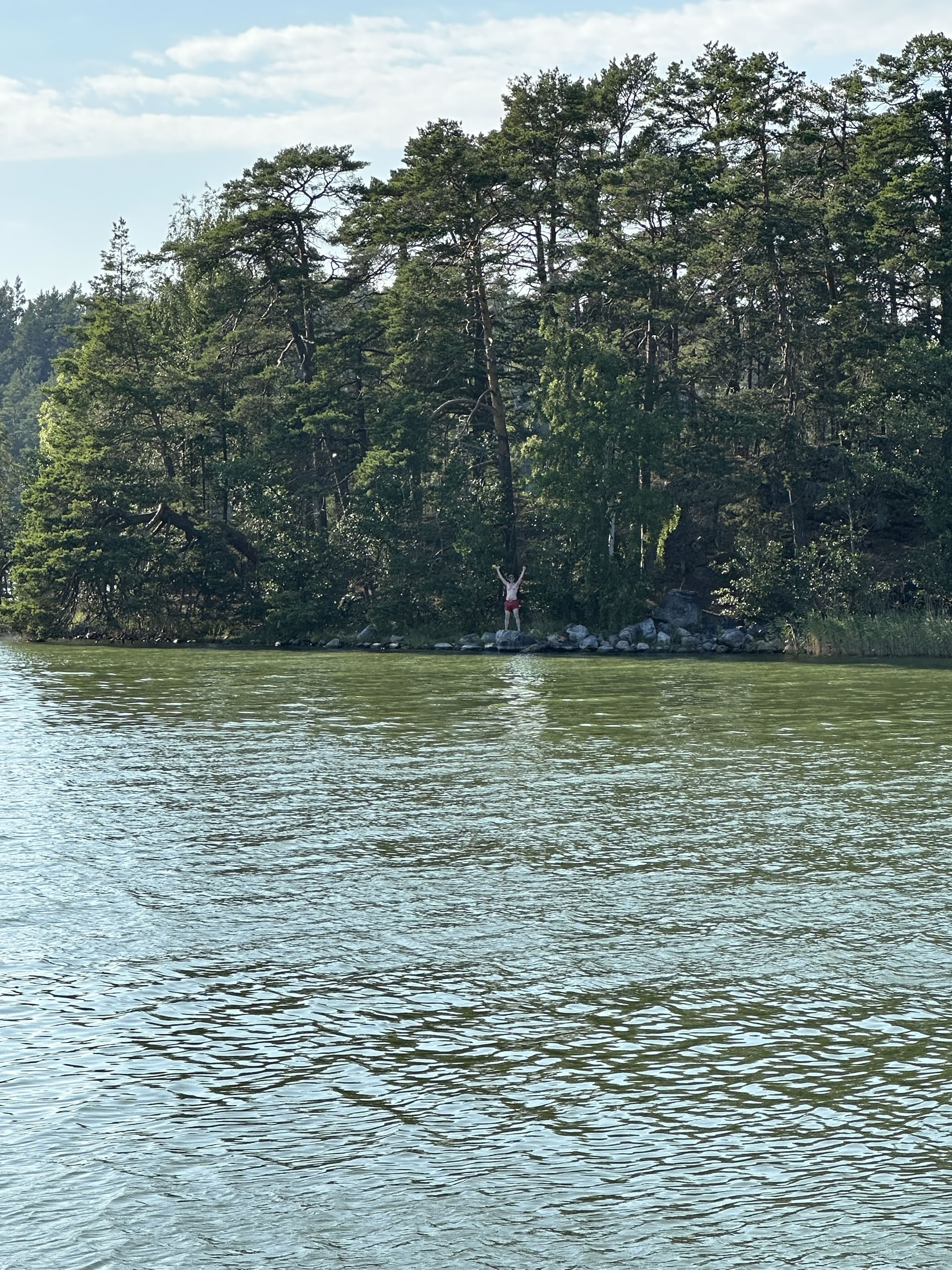 David M. Green swims to the island, 21 July 2025